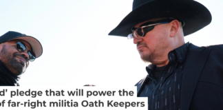 Enrique Tarrio, left, former leader of the far-right group the Proud Boys, shakes hands with Oath Keepers founder Stewart Rhodes in Washington on Feb. 21, 2025. Chip Somodevilla/Getty Images